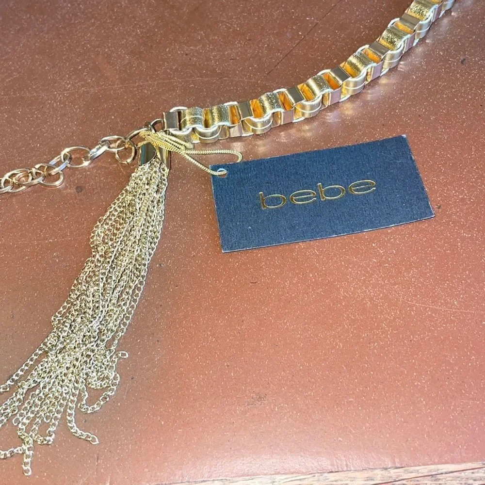 BEBE gold tassel belt